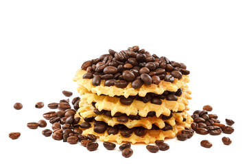 Waffle cookies and coffee grains on a white background