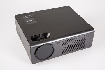 Generic multimedia black modern projector isolated on white background