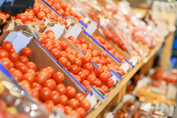 tomatoes on the counter in the store