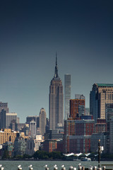 Fototapeta na wymiar New York City skyline with clear sky and buildings, skyscrapers