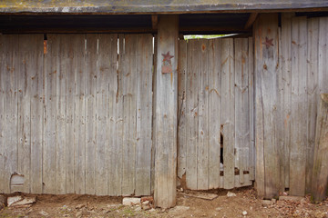Old wooden gate of a village house where a military veteran once lived