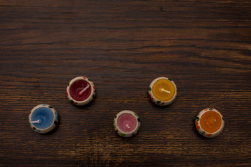 Obraz na płótnie Canvas Close-up of colorful tea light candles