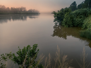 Fototapeta na wymiar Misty River Sunrise