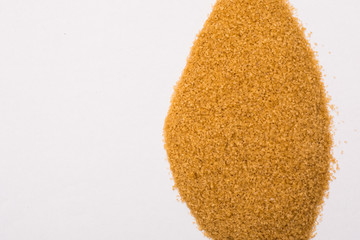 close up of brown sugar  on white background