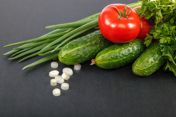 Fresh vegetables assorted on a black background
