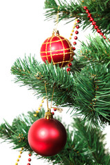 Decorated artificial Christmas tree isolated on white background