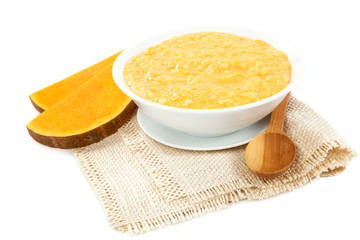 Pumpkin porridge on white background. Healthy eating.
