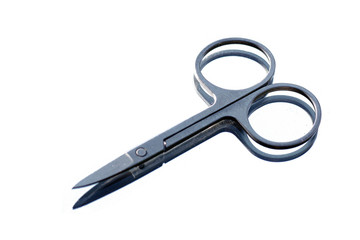 Mirrored manicure scissors on white background isolated