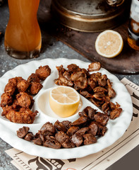 fried dushbere with beer mug on the table