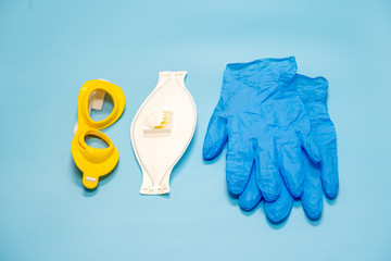 Medical mask, glasses and gloves mask on the background, protection against coronavirus....