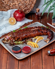 fried fish lemon slices on the table