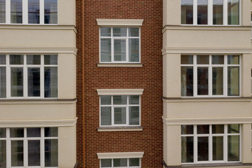 Obraz premium The property. New modern building with balconies, close-up, fragment. Close-up of glass balconies of modern hotel building