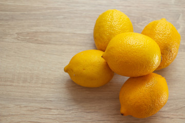five lemons on the table