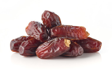 Heap of dates isolated on white background