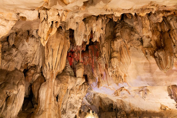 Stalactite, a type of formation that hangs from the ceiling of caves.  Cave interior in VangVieng, Laos.