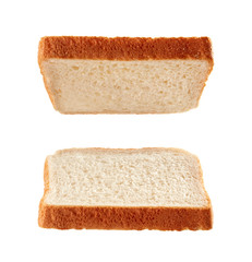 Slices of toast flying isolated on white
