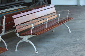 Example of hostile design or aggressive industrial design. A timber and metal bench seat at a train...