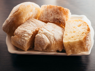 Sliced homemade bread in flour.
