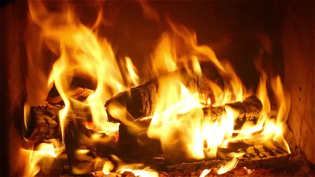 Stock video bright fire in a fireplace