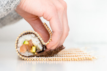 Sushi roll Japanese food tuna and cucumber with spicy wasabi maki rolled handmade
