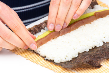 Sushi roll Japanese food tuna cucumber preparing ingrediants on algae sheet