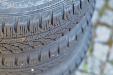 close-up of black tyres on a stack