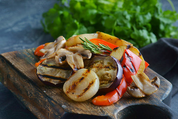 grilled vegetables on a cutting Board