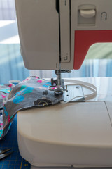 sewing homemade masks at home with sewing machine,to prevent transmission of the COVID-19 coronavirus