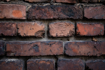 Brown-red, old brick wall