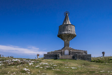 Monument of the Virgin of Orduña on the summit of peak Txarlazo, near Orduña, Basque Country,...