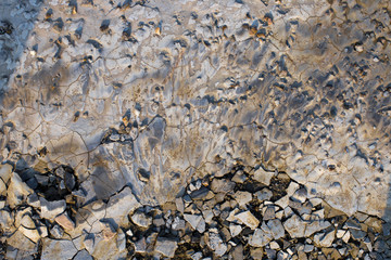 Top view of cracked black dry ground, natural background.