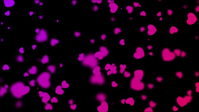 Seamless looping animation of flying red and purple hearts over black background
