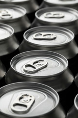 Row of beer cans closeup
