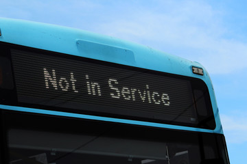 The top of a New public transport bus. Close up of the digital signage reading "Not in Service"