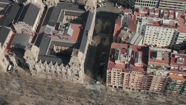 AERIAL: Wide Shot flight over Barcelona on Bright Sunny Day 