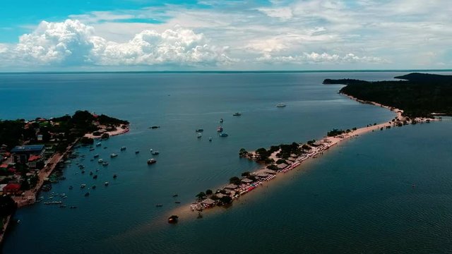 Early afternoon drone footage of boats in the harbor at Alter do Chao, near Santarem, Para, Brazil.
