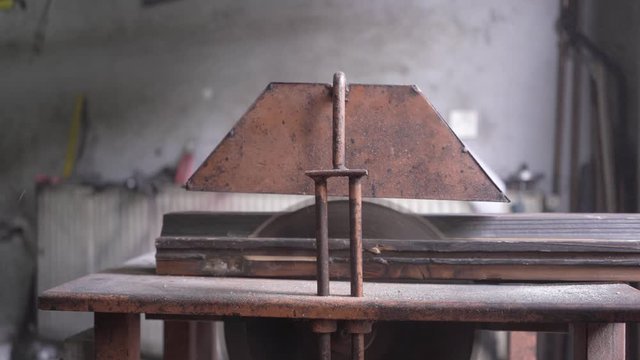 Cutting peas of wood on circular saw