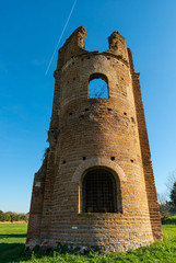 Obraz premium One of the towers at the entrance to the Circus of Emperor Maxentius. This large archaeological site is located along the Via Appia Antica an important commercial street of ancient Italy. Rome.