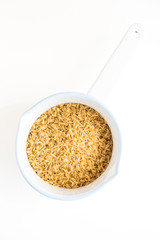 Brown Rice in White Enamel Pot
