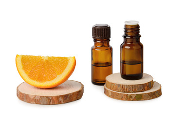 Orange citrus essential oil in bottle isolated on white background