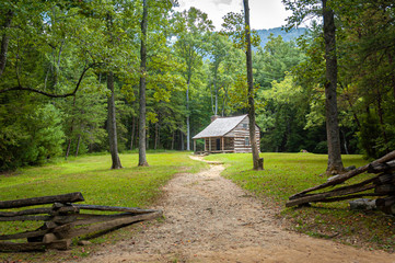 Log cabin in the woods at Smokey Mountains National Park.