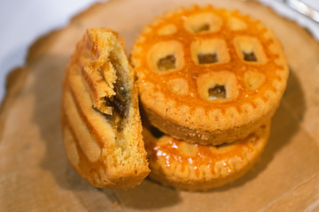 Confectionery - still life. Cookies, bakery products, tangerines, eggs. Cooking dessert and sweets. Sugar and cafe. Coffee or tea to buns. Still life with food