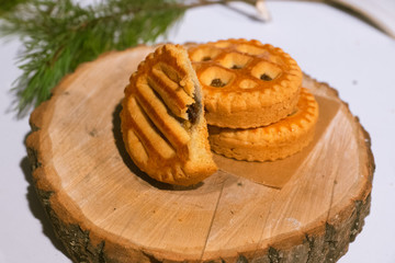 Confectionery - still life. Cookies, bakery products, tangerines, eggs. Cooking dessert and sweets. Sugar and cafe. Coffee or tea to buns. Still life with food