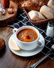 lentil soup with bread on the table