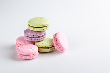 colorful macaroons on white background