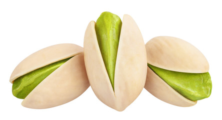 Close-up of ripe pistachios, isolated on white background