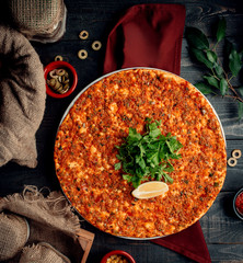 meat lahmacun with green and lemon