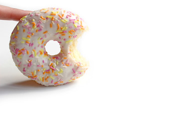 Donut with Pink and Yellow with icing and topping isolated on a White Background