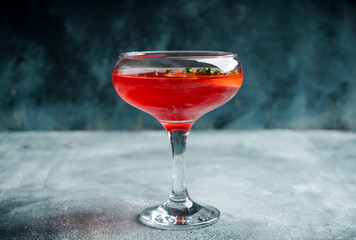 Blood oranges margarita on the rustic background. Selective focus. Shallow depth of field.