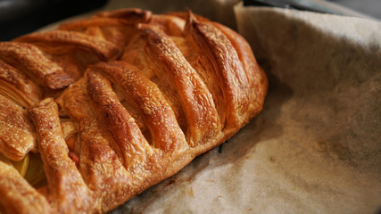 Meat pie with puff pastry. Beautiful golden crust. Crispy Tasty Lunch